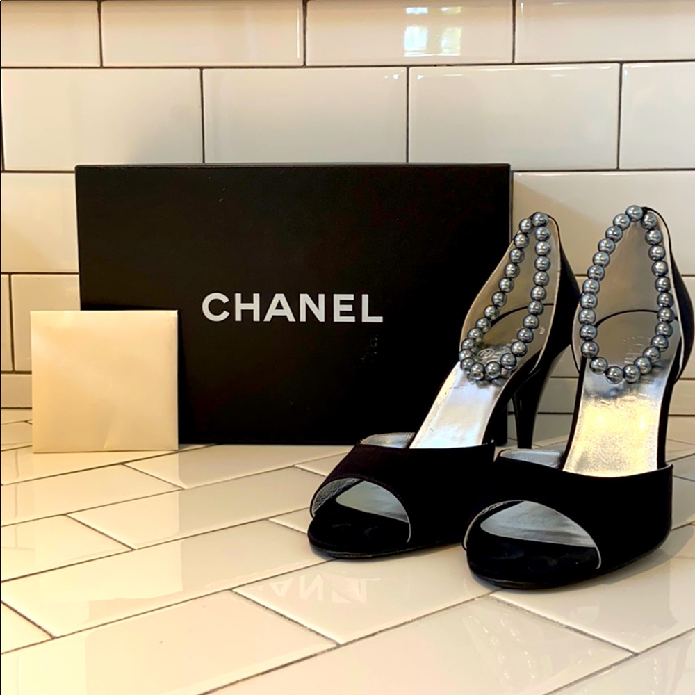 Stunning CHANEL heels with silver pearl straps.